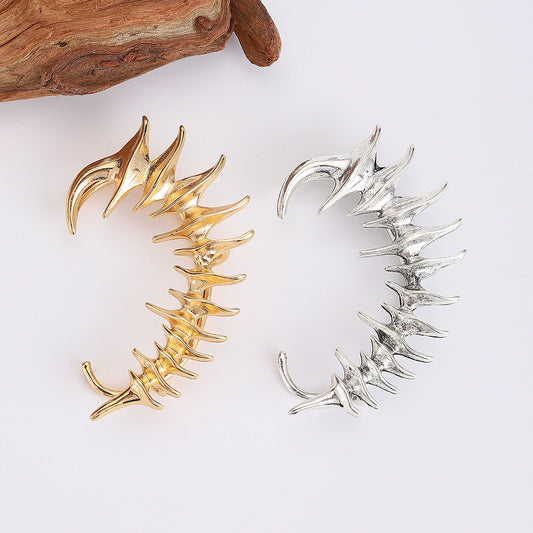 Chrome Hearts Mechanical Spine Earrings